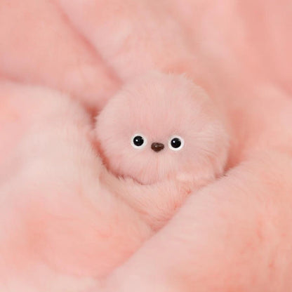 Mirumi™ – La peluche qui s'accroche partout